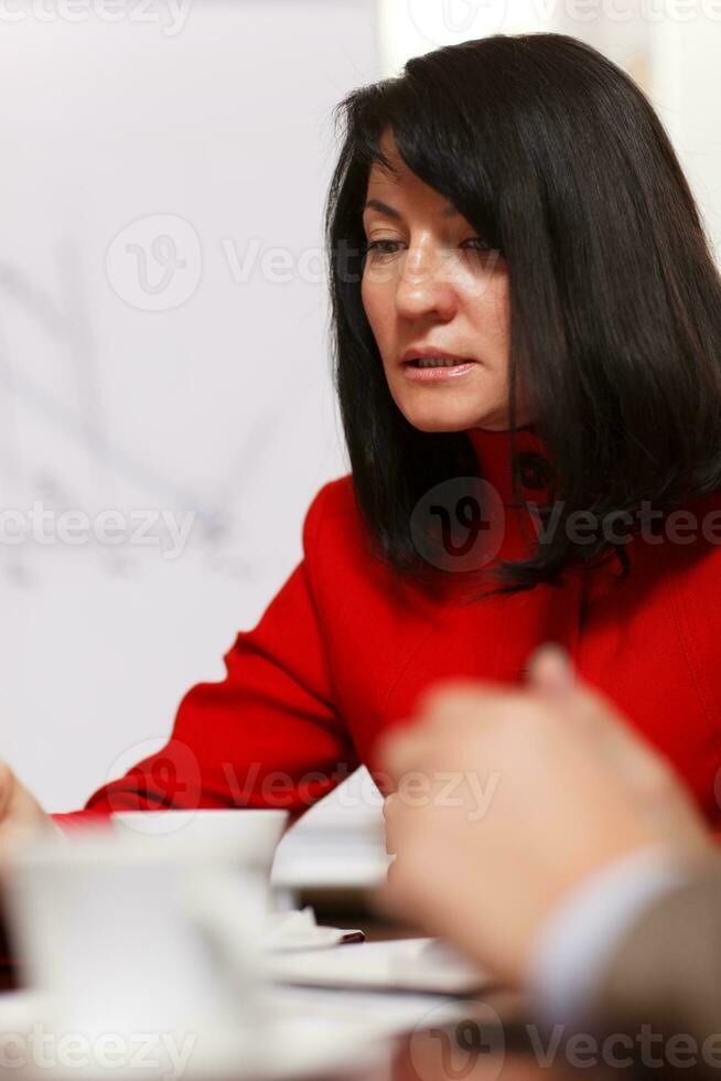 Worried businesswoman in a meeting photo