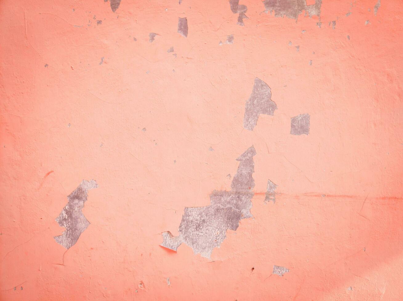 abstract background texture of an orange damaged wall photo