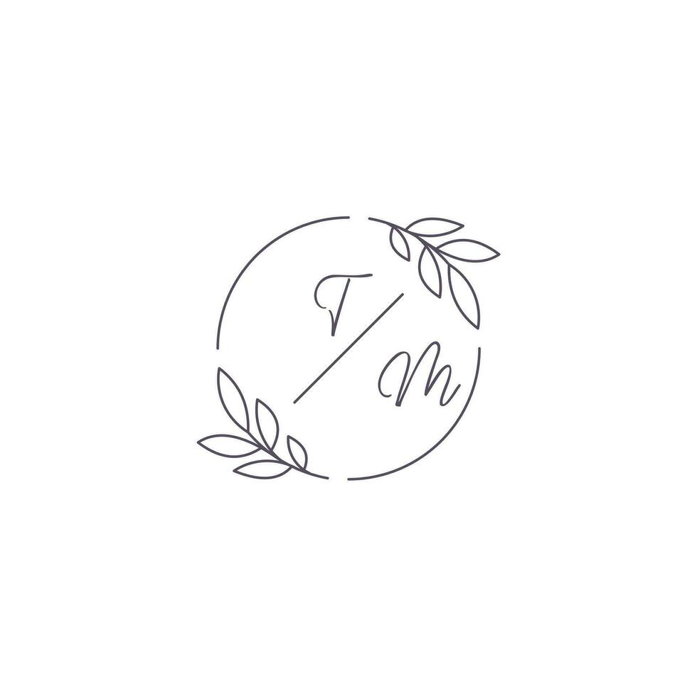 Initials TM monogram wedding logo with simple leaf outline and circle style vector