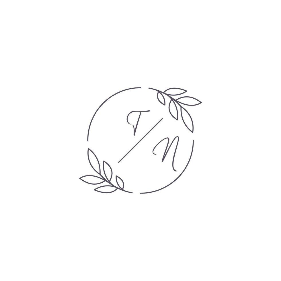 Initials TN monogram wedding logo with simple leaf outline and circle style vector