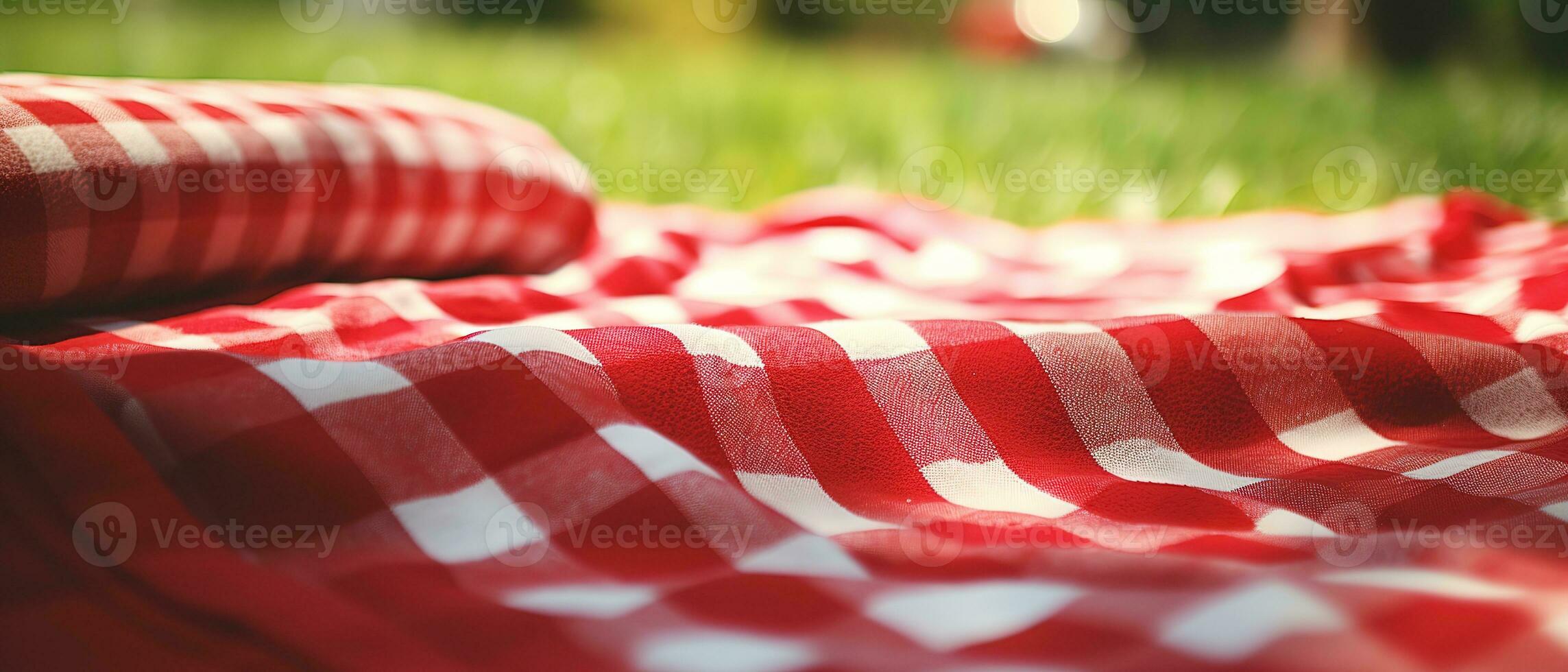 Red and white plaid picnic blanket on top of a green field in sunny day on grass of lawn in summer park. Blurred Background. Generative AI photo