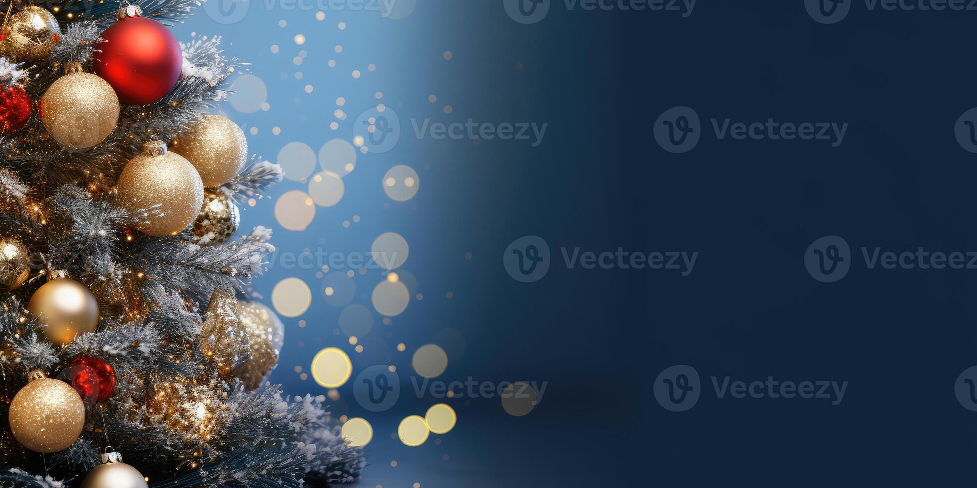 christmas tree with gold and red ornaments on blue background . photo