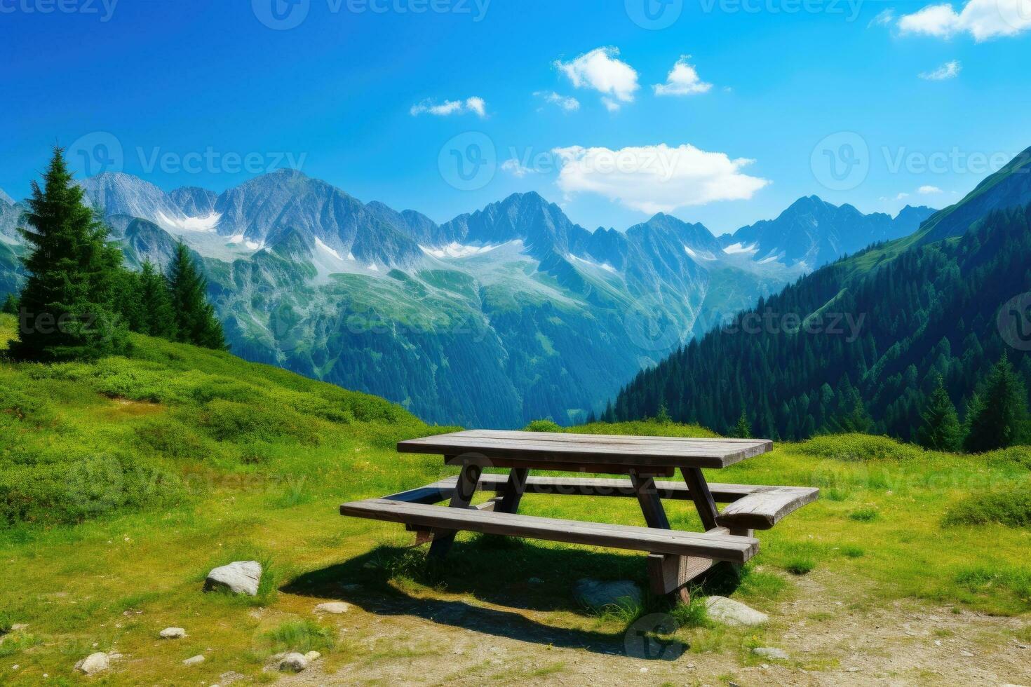 Picnic bench in the mountains photo