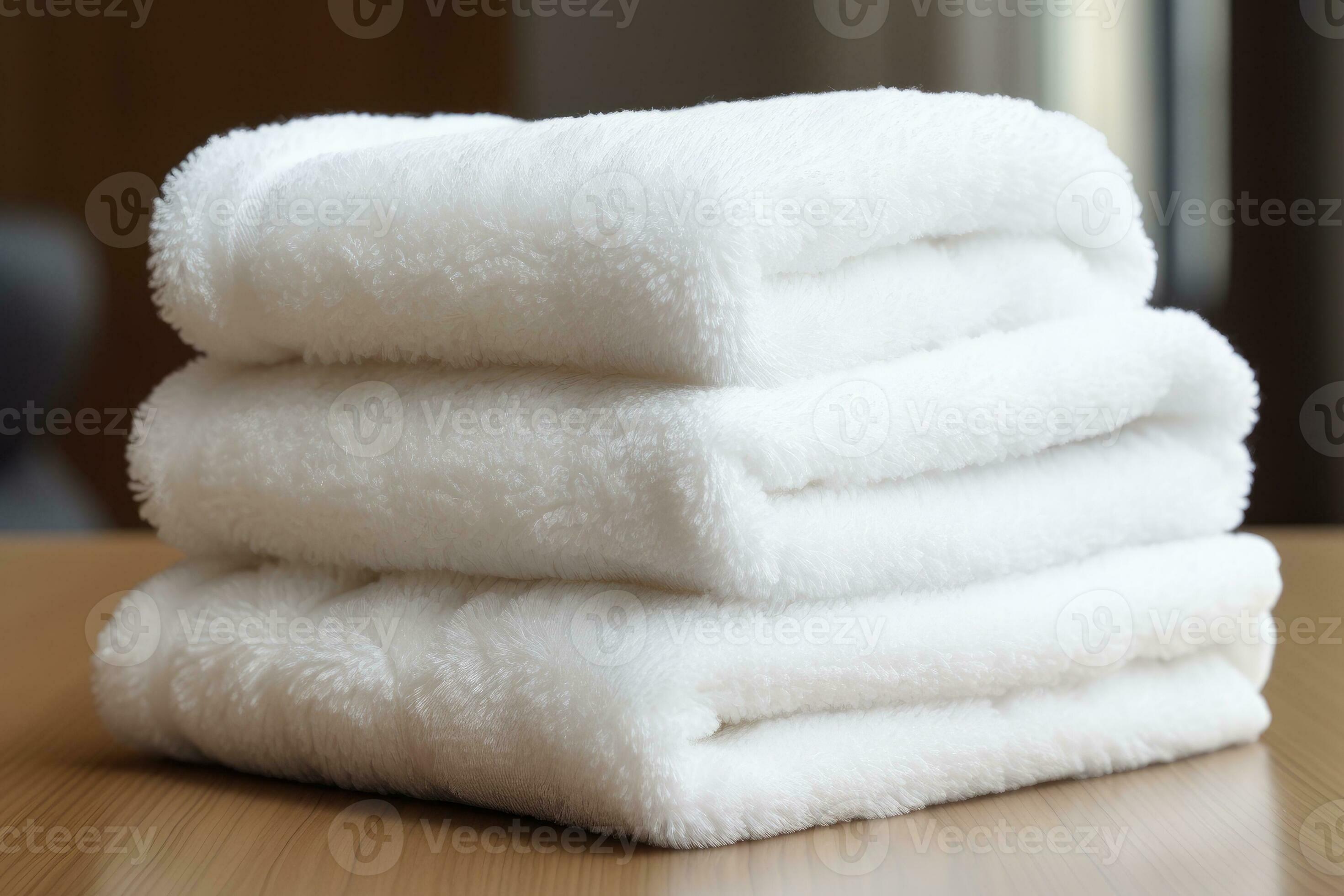Set of fluffy clean towels available for guest use. 28137890 Stock