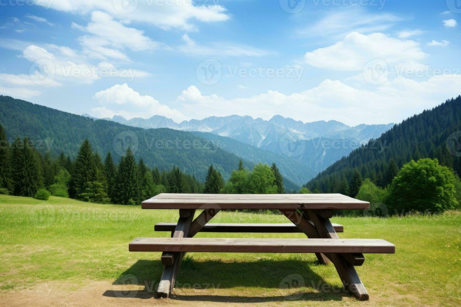 Picnic bench in the mountains photo