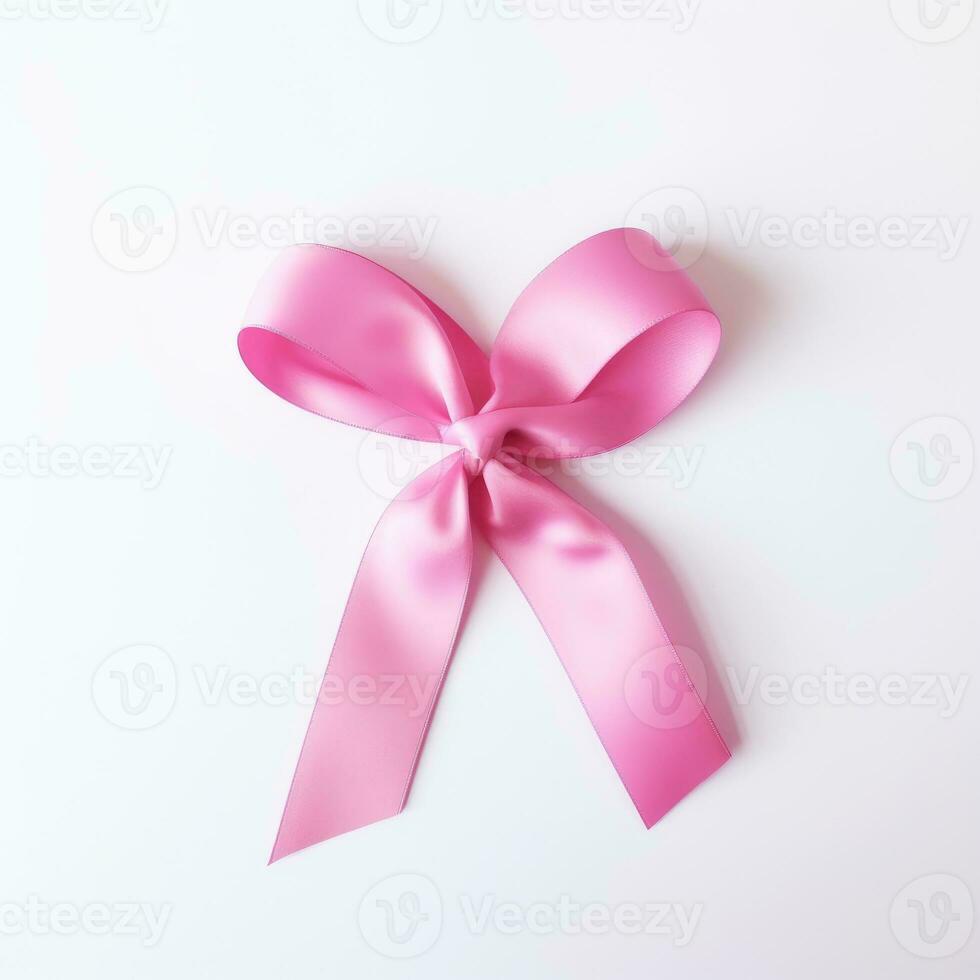 A pink ribbon on a white background. Breast Cancer Month. photo