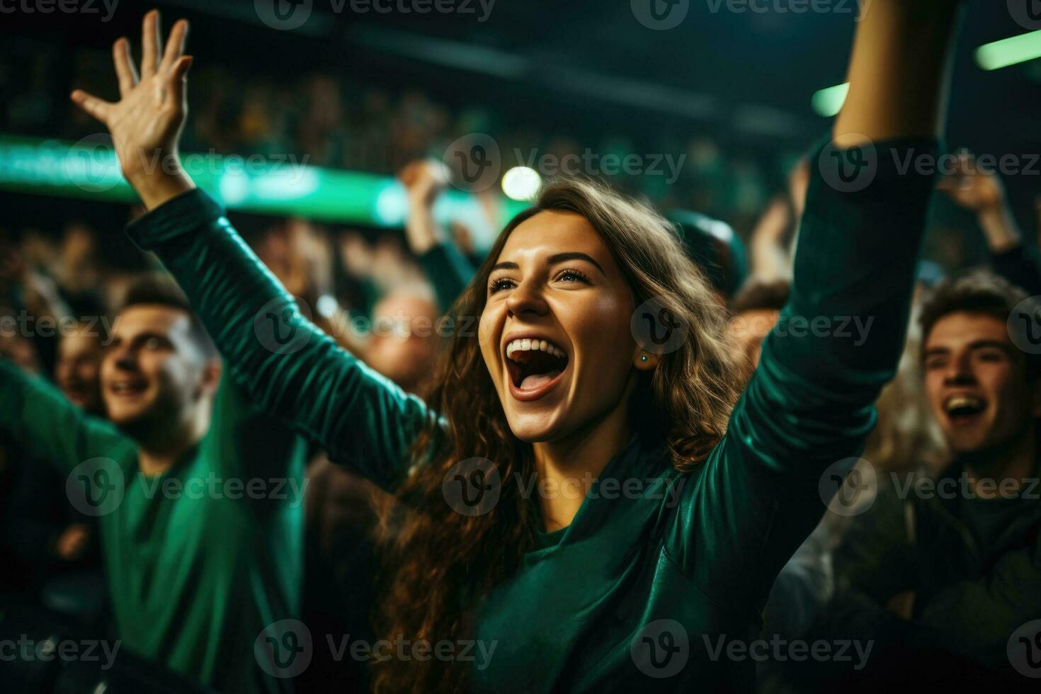 A group of enthusiastic football fans gather under stadium lights ready to cheer on their favorite team for the opening game of the season photo