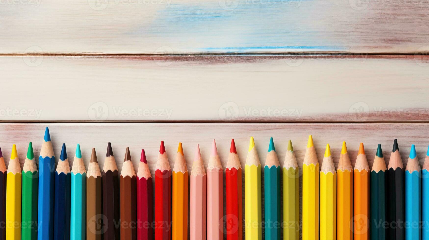 A brightly colored pencil case surrounded by school supplies background with empty space for text photo