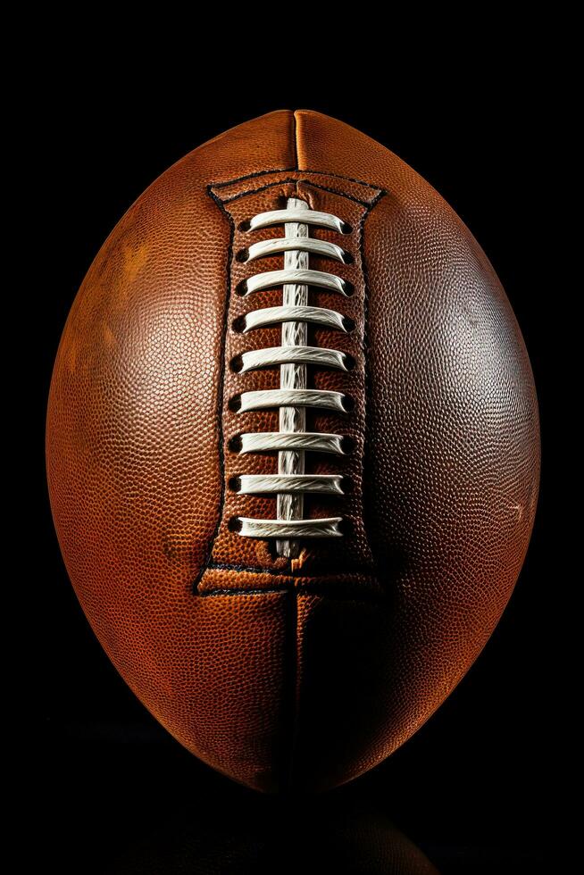 An inflated football ready to be kicked symbolizing the start of a new football season placed on a white background photo