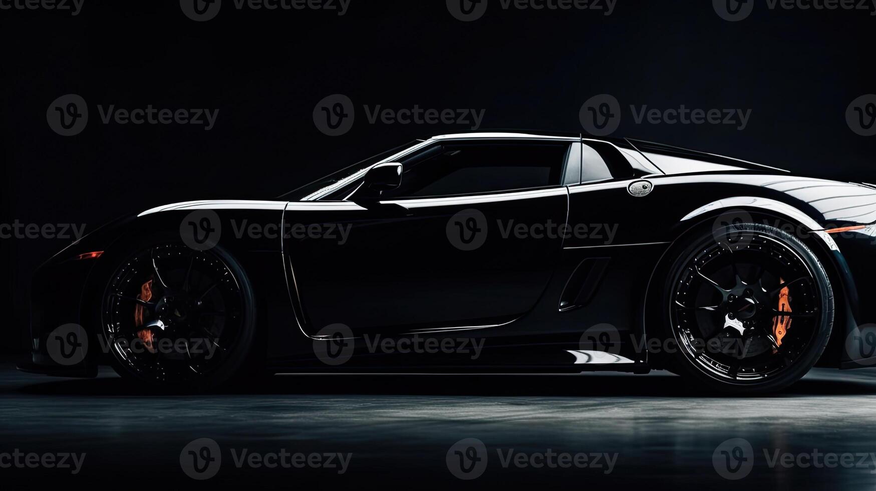 Close up front view of black sports car with copy space. photo