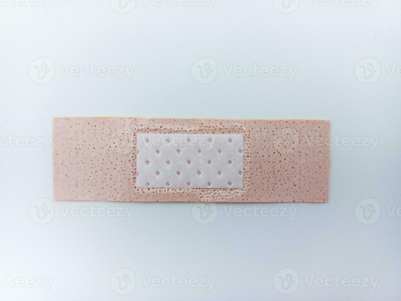 Small Size Adhesive Bandage Isolated On White Background. Inside View photo