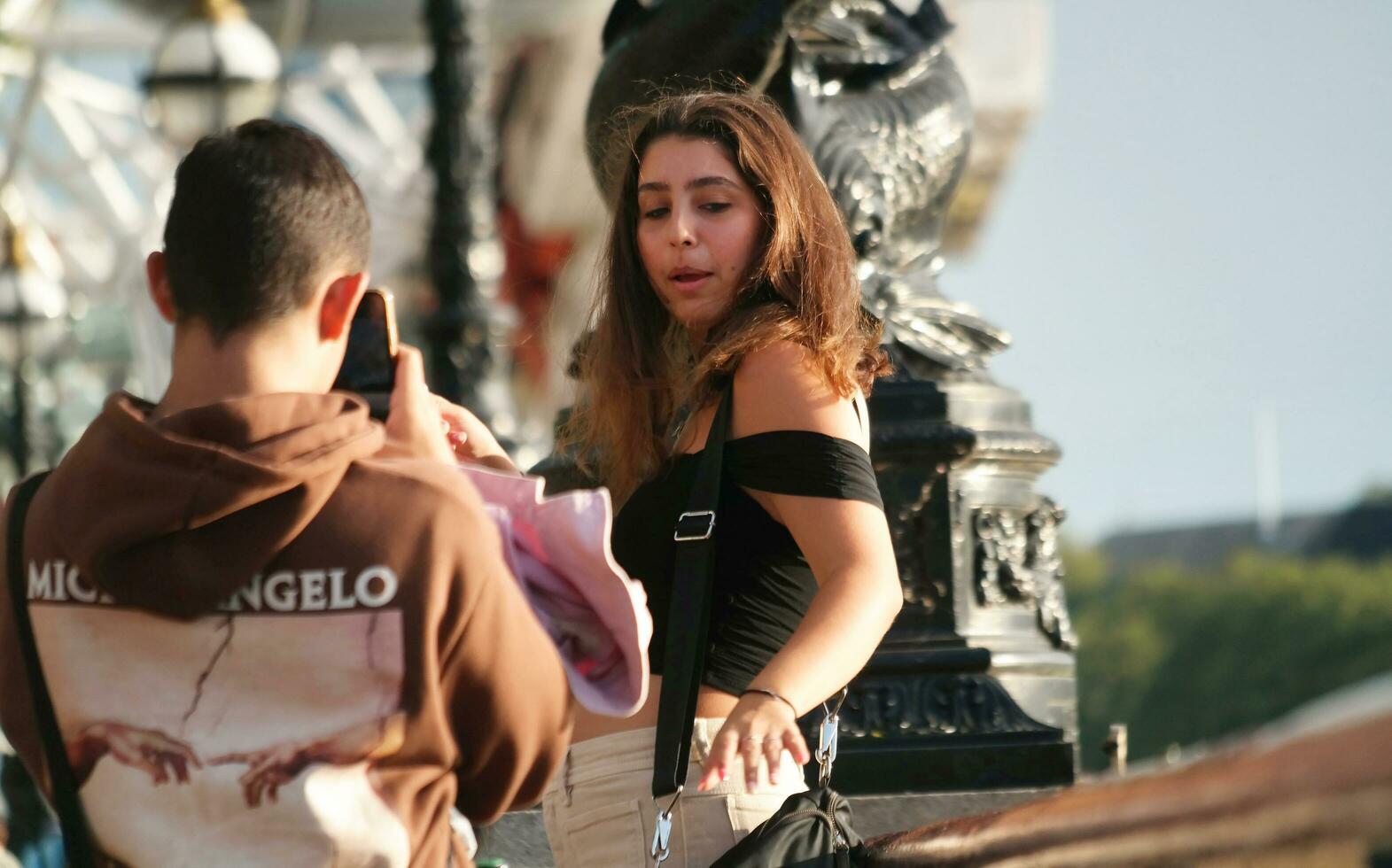 Beautiful Low Angle Image of People at Central London capital City of England Great Britain, Most of the Tourist are International from Many Communities of World. Image Captured on August 2nd, 2023 photo