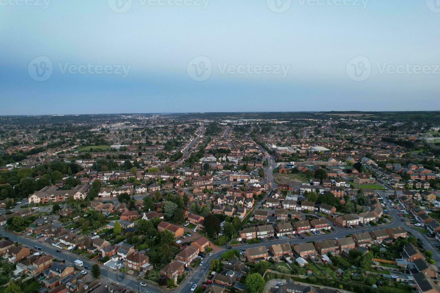 Aerial View of Residential Real Estate Homes at East of Luton City of England, Great Britain. Footage Was Captured with Drone's Camera on August 19th, 2023 During Sunset Time. photo