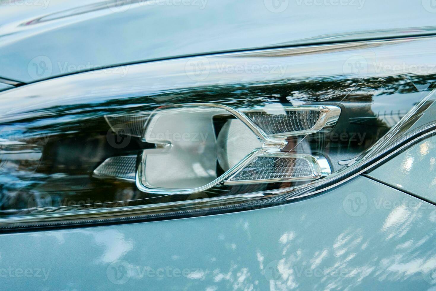 Modern car headlight with led lamp, close up photo