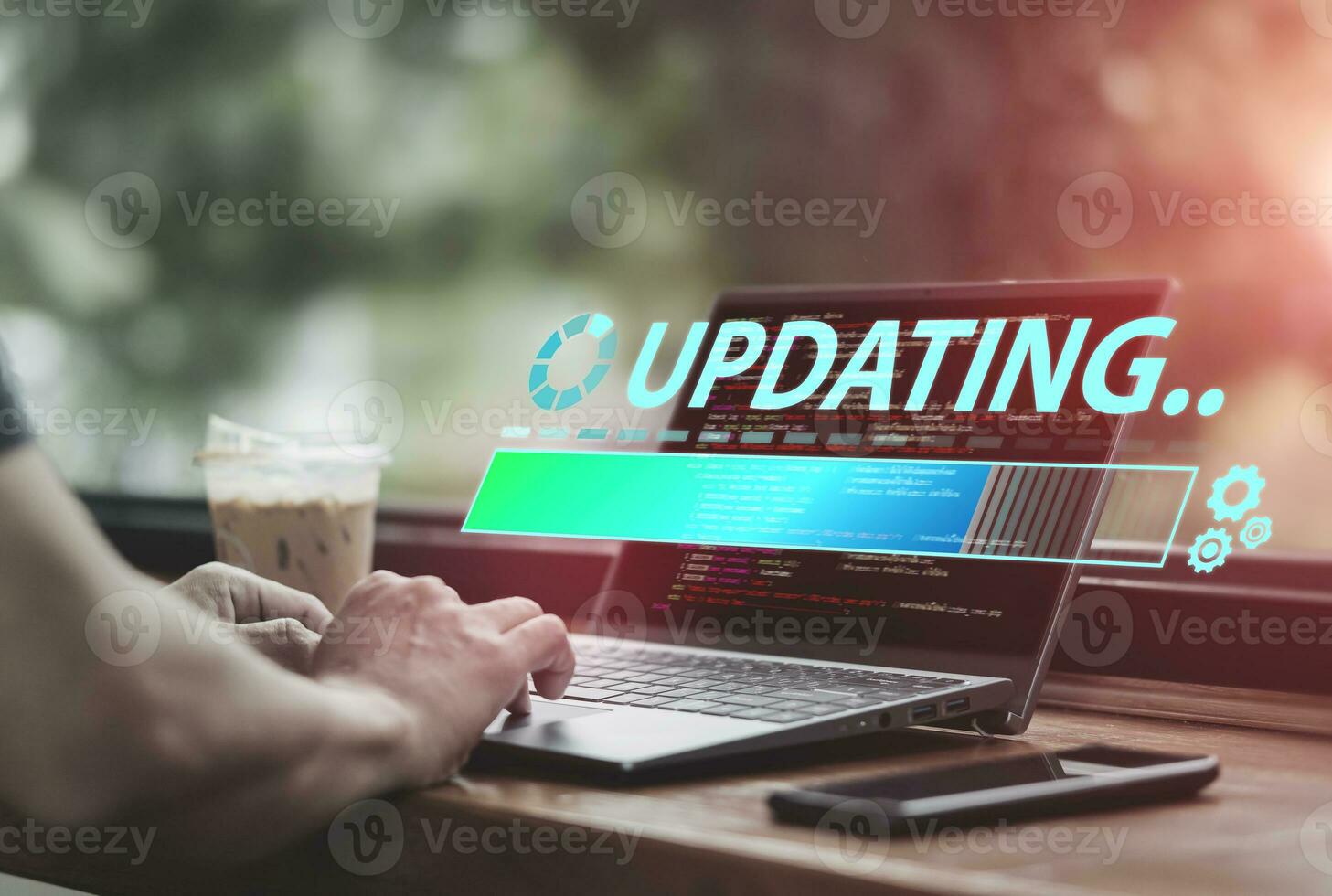 Programmers design system code to upgrade program functionality on tablets. concept of improving system by updating computer software to support modern technologies via Internet. photo