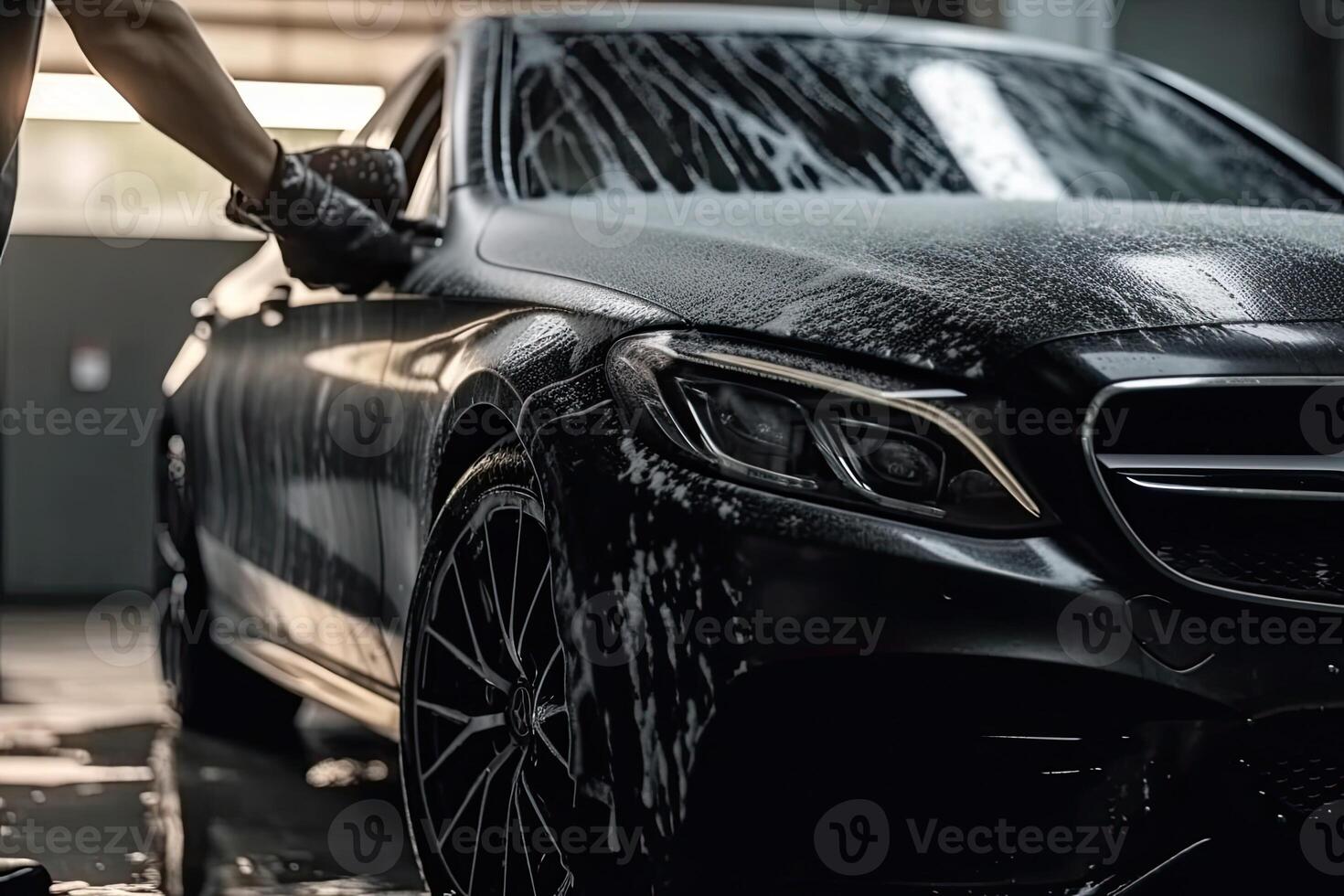 Car washing series Cleaning the car with high pressure water. photo