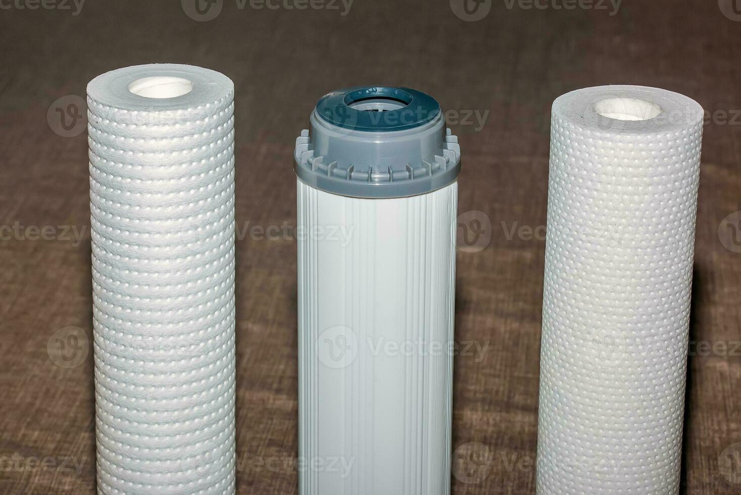 Clean water filters are ready for installation. The process of replacing the cartridges of a multi-stage water filter. photo