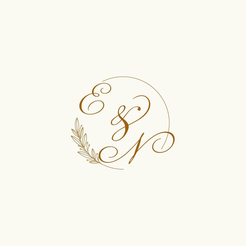 Initials EN wedding monogram logo with leaves and elegant circular lines vector