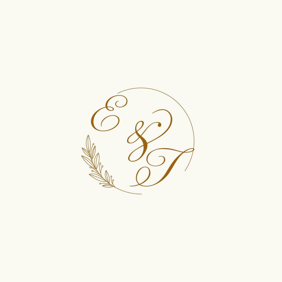 Initials ET wedding monogram logo with leaves and elegant circular lines vector