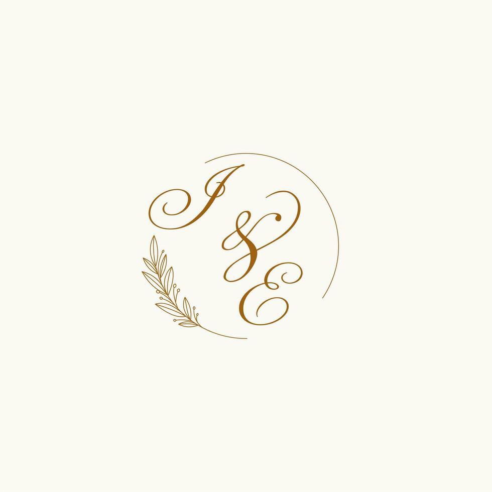 Initials IE wedding monogram logo with leaves and elegant circular lines vector