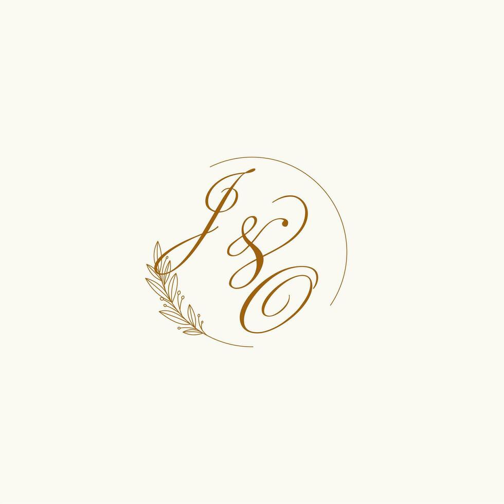 Initials JO wedding monogram logo with leaves and elegant circular lines vector