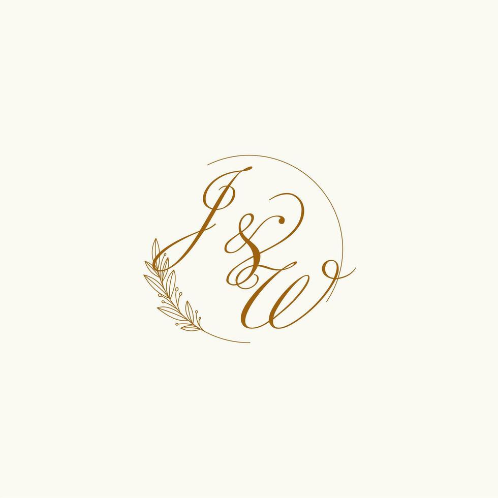 Initials JW wedding monogram logo with leaves and elegant circular lines vector