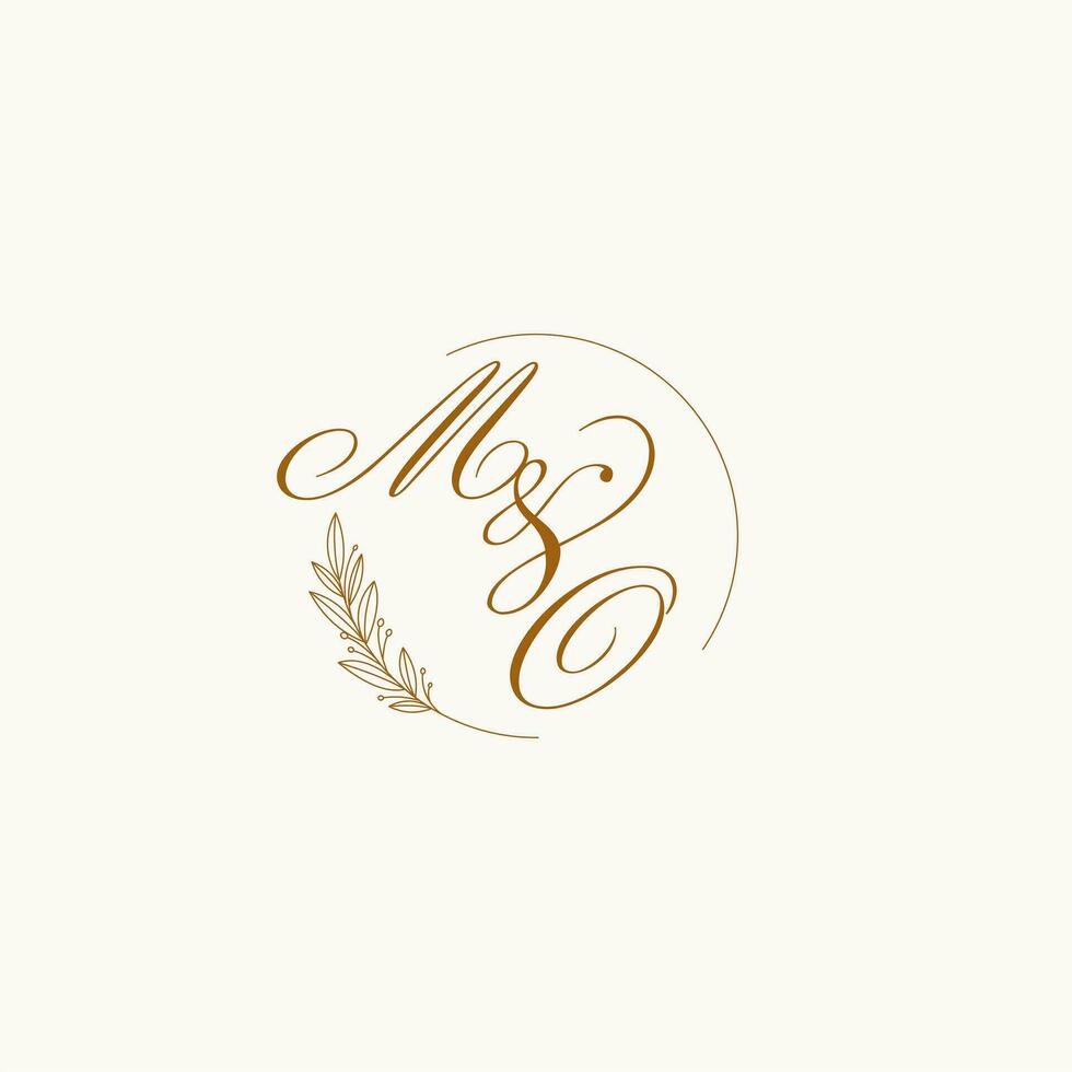 Initials MO wedding monogram logo with leaves and elegant circular lines vector