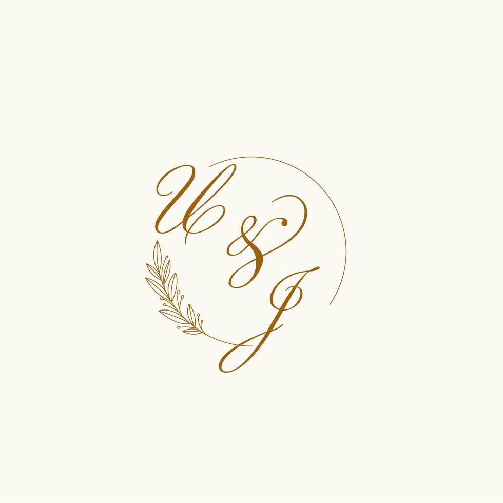 Initials UJ wedding monogram logo with leaves and elegant circular lines vector