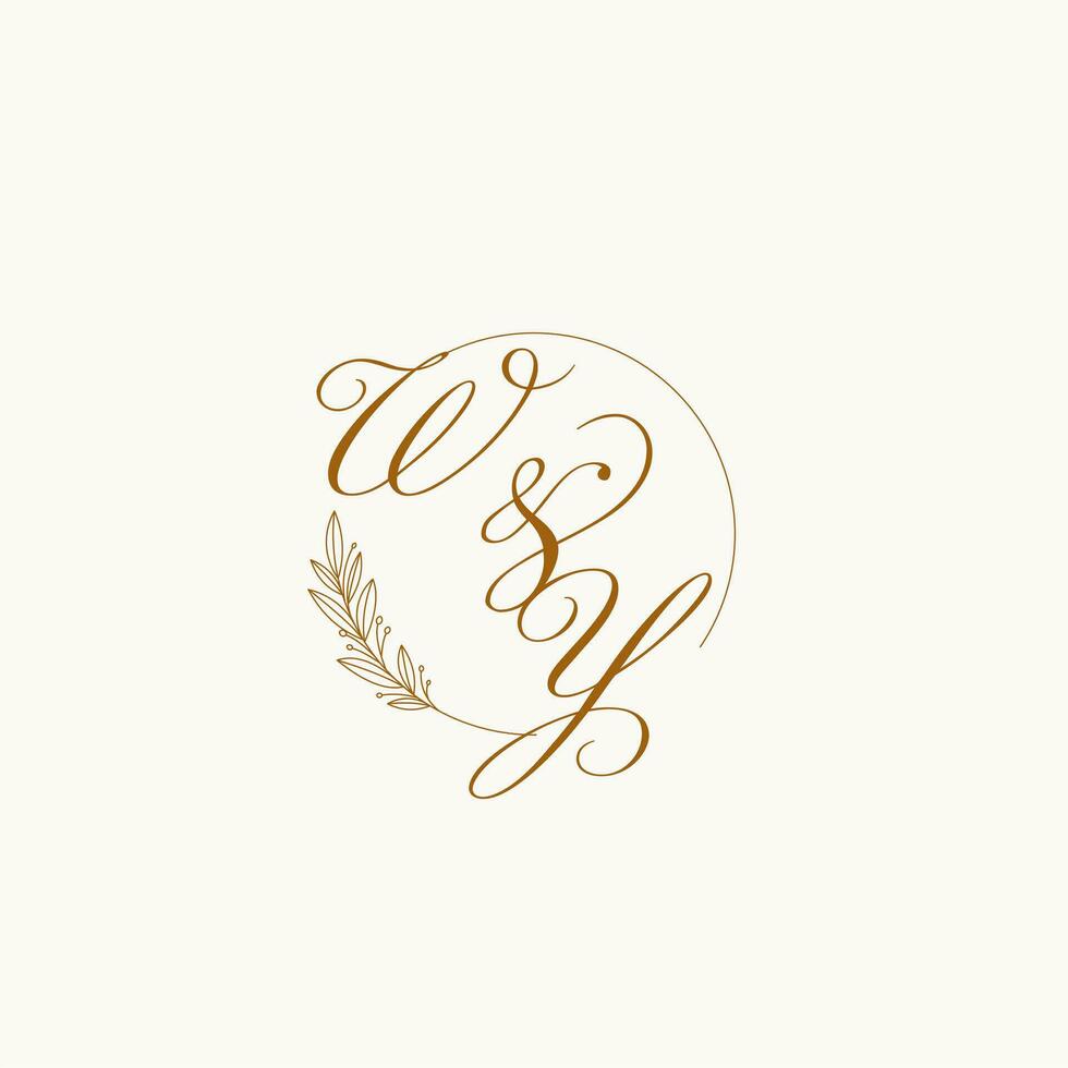 Initials WY wedding monogram logo with leaves and elegant circular lines vector