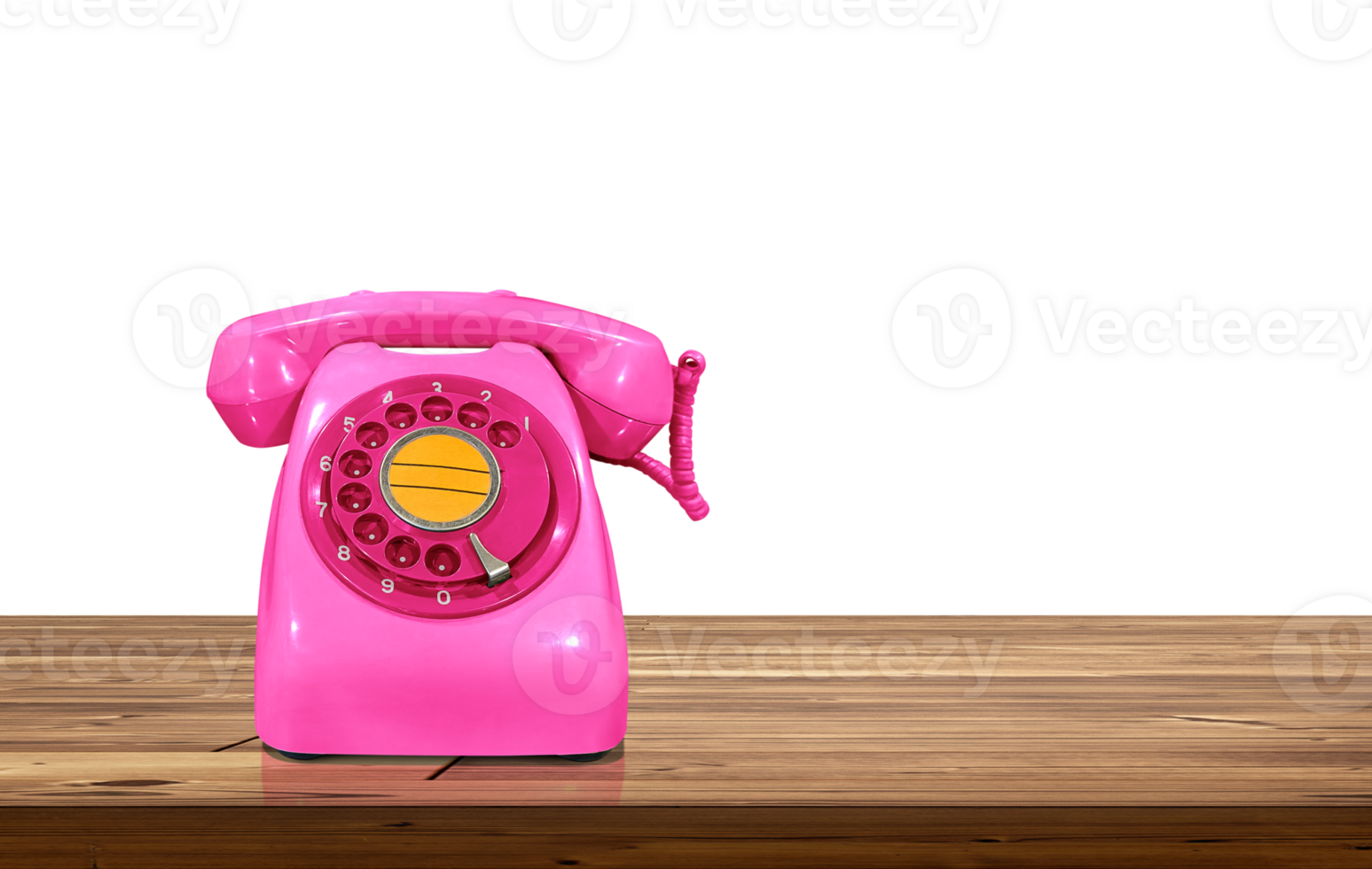 Old style pink desk phone on wooden table isolated PNG transparent