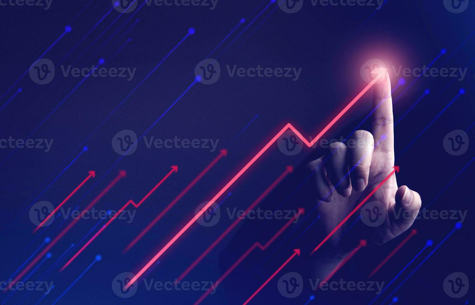 Businessman's hand showing rising arrow on dark background. concepts of business that express the development or increasing business opportunities and more profits photo