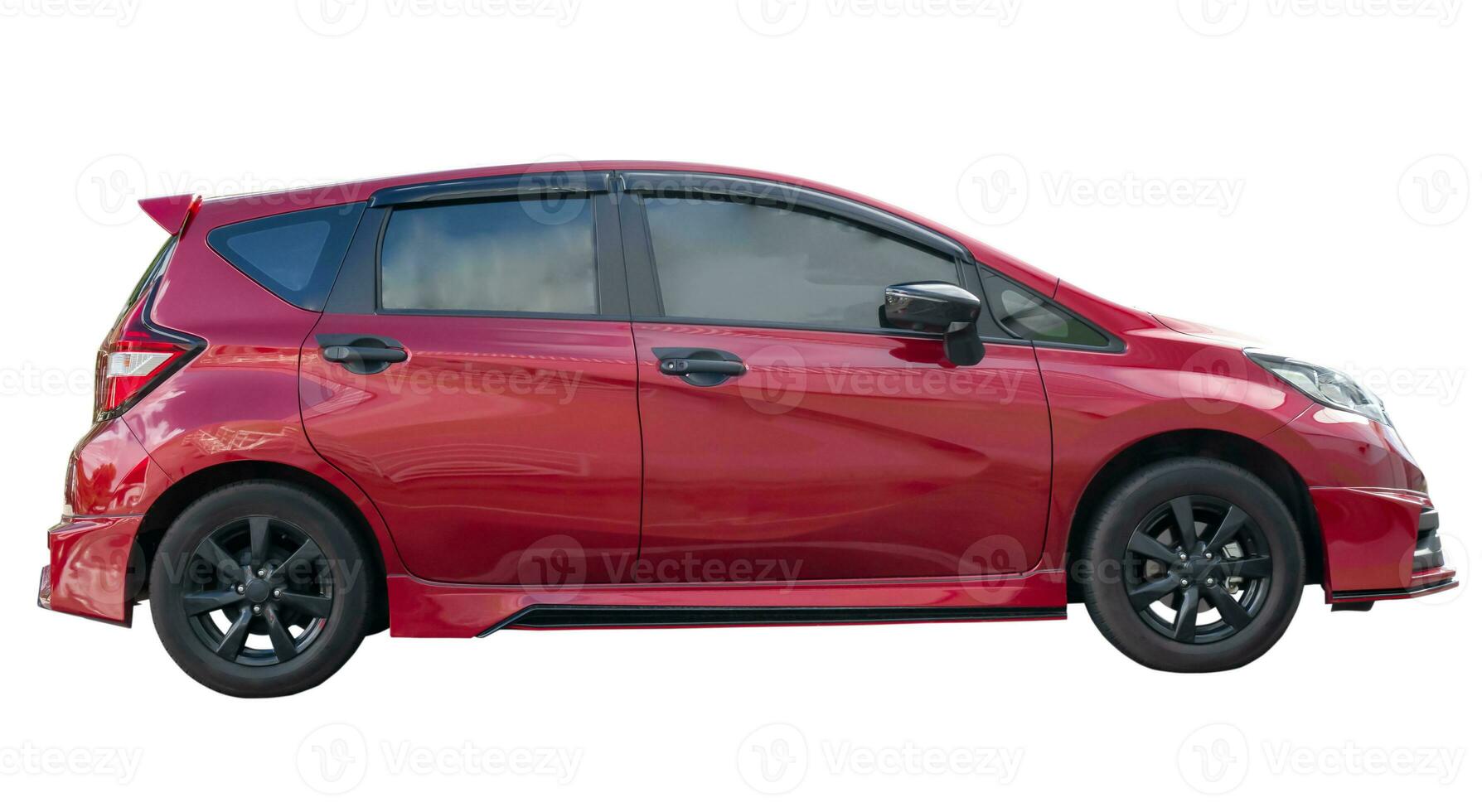Single lovely small red hatchback car isolated on white background with clipping path photo