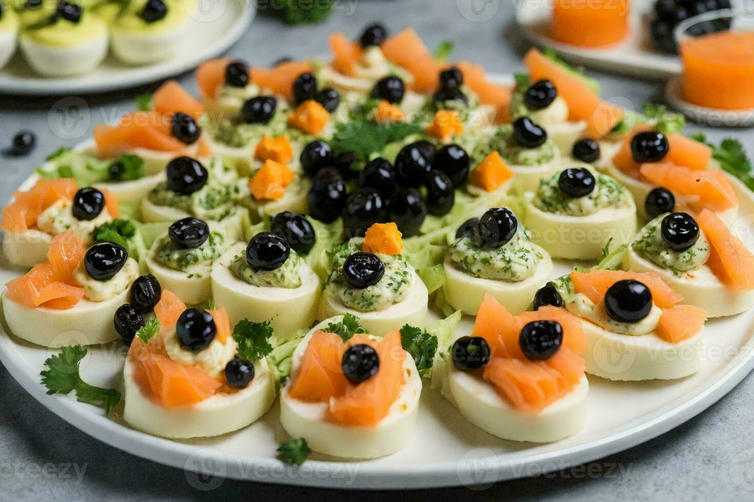 a stunning platter of appetizers on a silver platter, placed on a pristine white tablecloth. photo