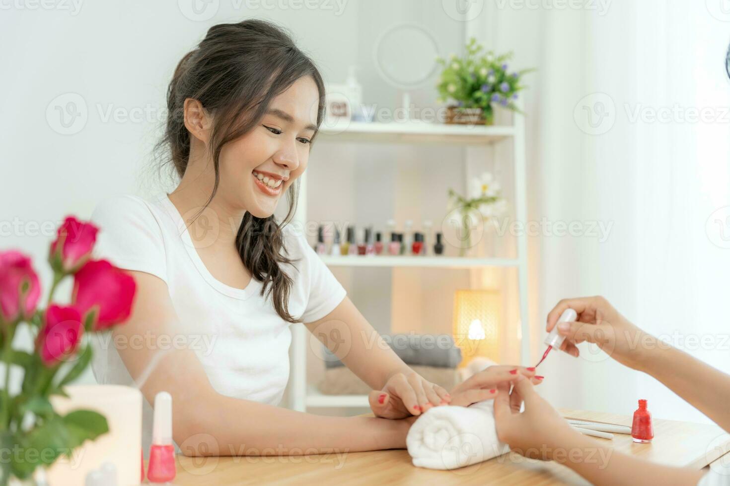 Woman receive care service by professional Beautician Manicure at spa centre. Nail beauty salon use nail file for Glazing treatment. manicurist make nail customer to beautiful. body care spa treatment photo