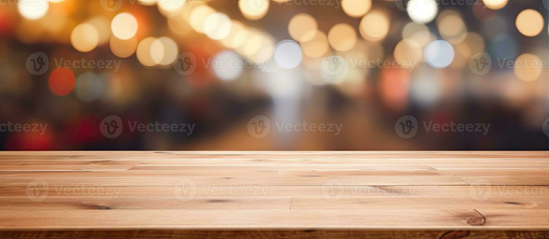 Blurred bokeh or store background seen through a wooden tabletop photo