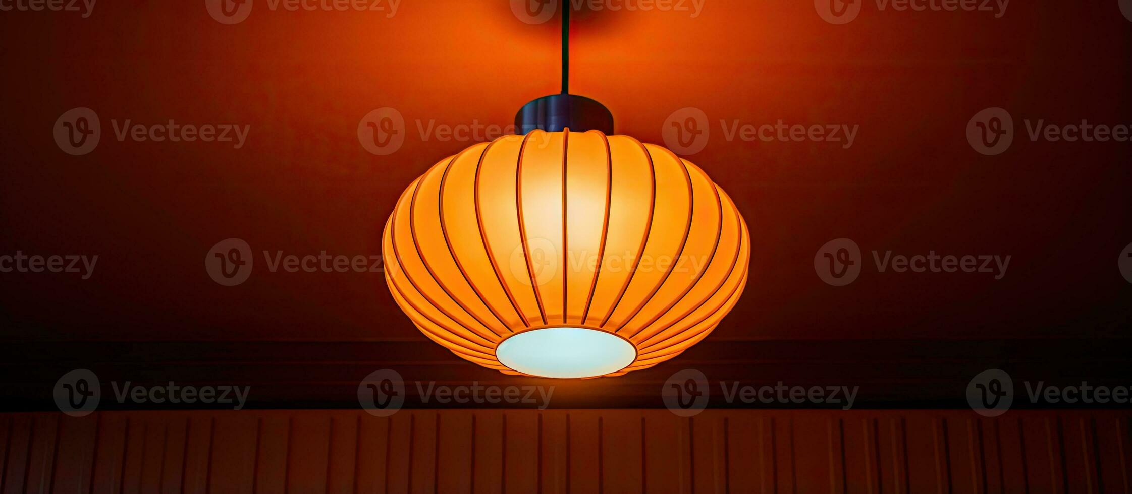 Ceiling mounted lamp in orange photo