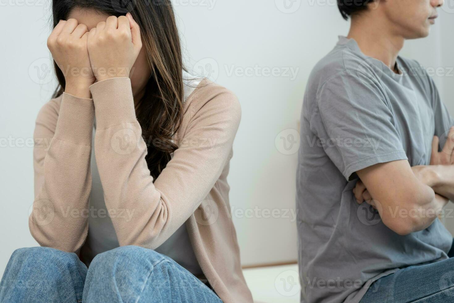 Divorce. Asian couples are desperate and disappointed after marriage. Husband and wife are sad, upset and frustrated after quarrels. distrust, love problems, betrayals. family problem, teenage love photo