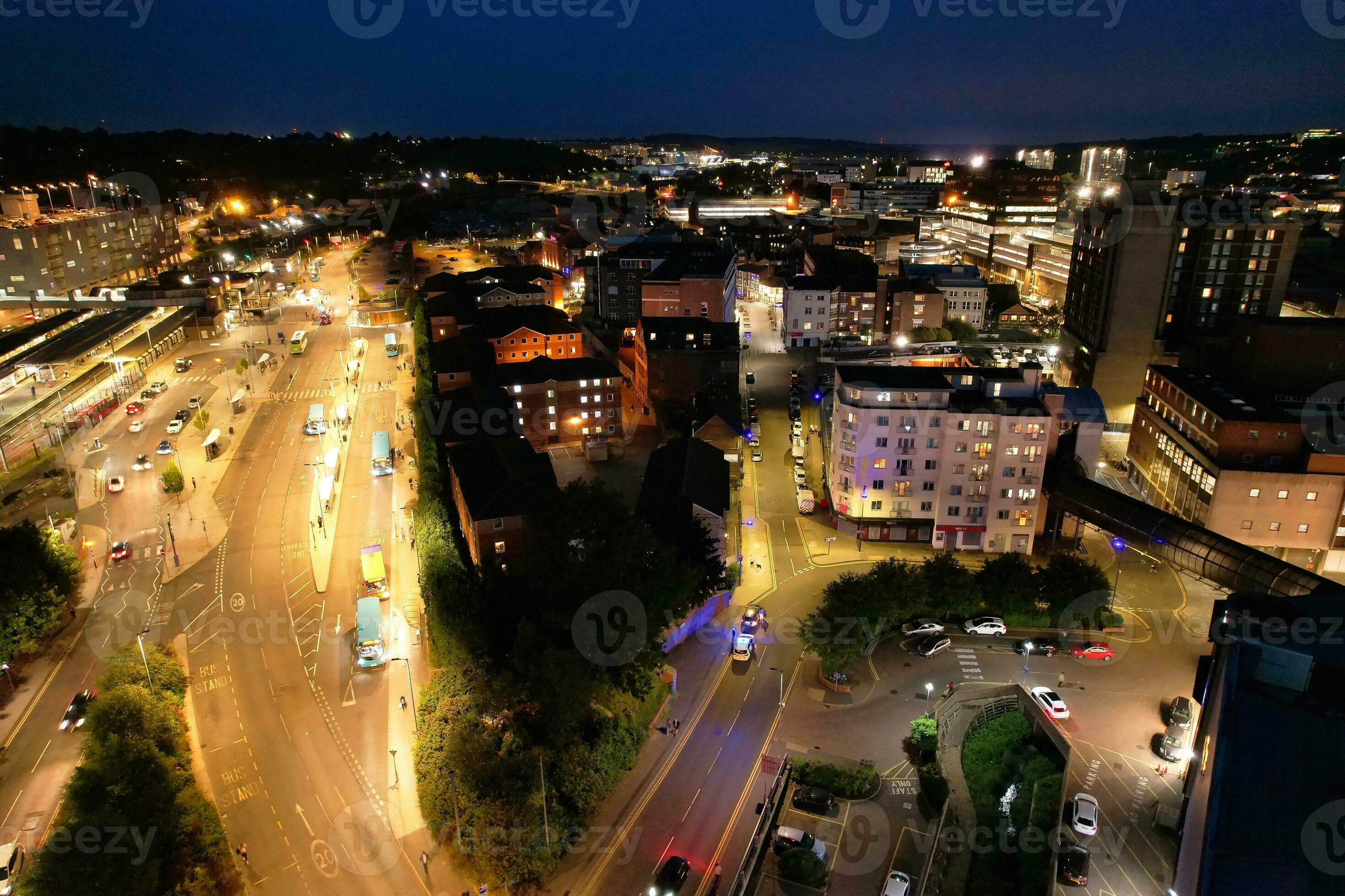 Aerial View Of Illuminated Downtown Buildings Roads And Central Luton aerial-view-of-illuminated-downtown-buildings-roads-and-central-luton