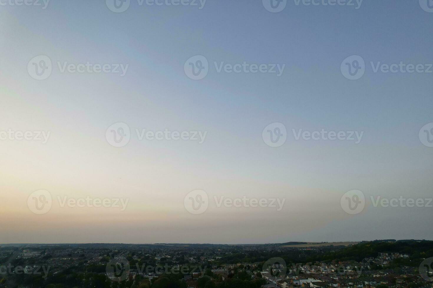 Aerial View of Illuminated Downtown Buildings, Roads and Central Luton City of England UK at Beginning of Clear Weather Night of September 5th, 2023 photo