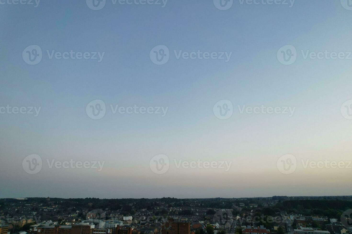 Aerial View of Illuminated Downtown Buildings, Roads and Central Luton City of England UK at Beginning of Clear Weather Night of September 5th, 2023 photo