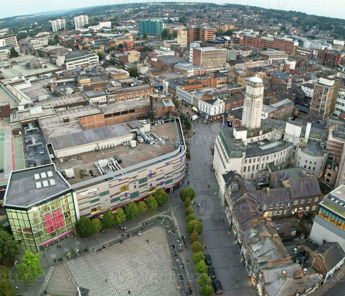 Aerial Vertical Panoramic View of Illuminated Downtown Buildings, Roads and Central Luton City of England UK at Beginning of Clear Weather's Night of September 5th, 2023 photo