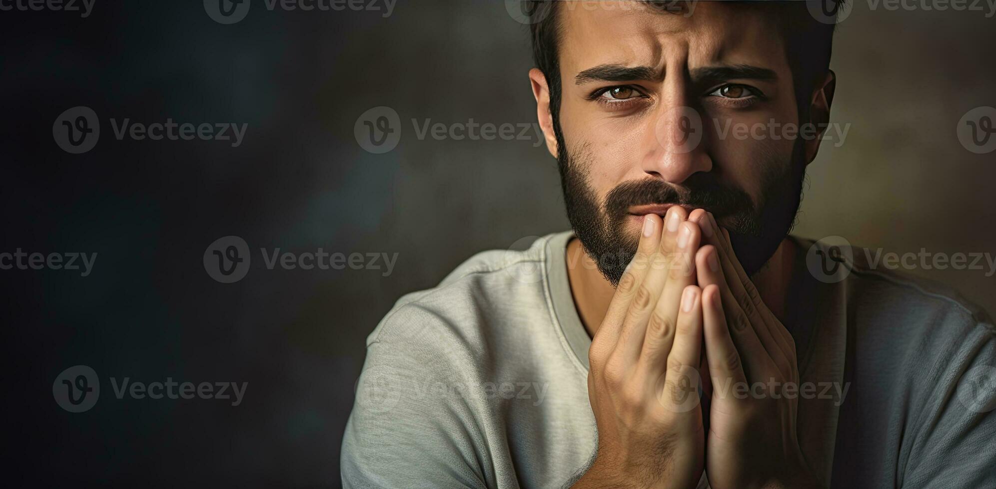 Sad man mourning on dark background. Sadness, grief and loss concept. AI Generated photo