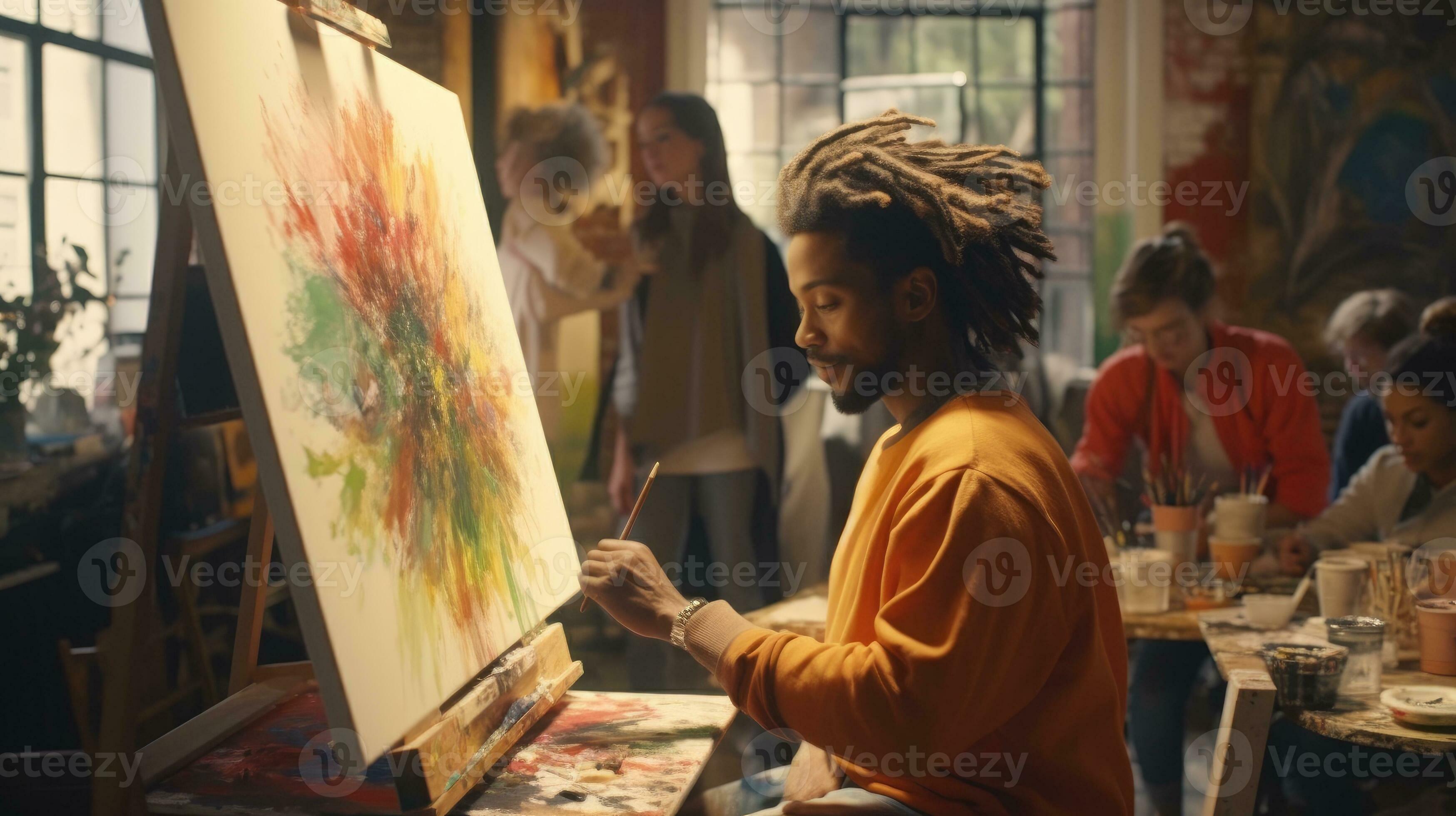 A black African American man with dreadlocks is a lefthanded artist