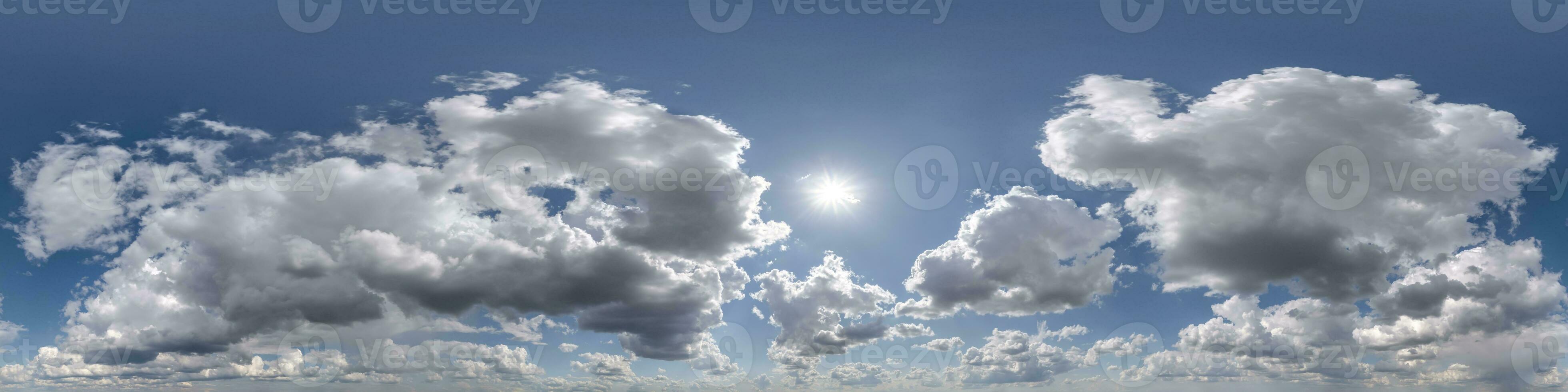 blue sky with beautiful cumulus clouds, seamless hdri 360 panorama view with zenith for use in 3d graphics or game development as sky dome or edit drone shot photo