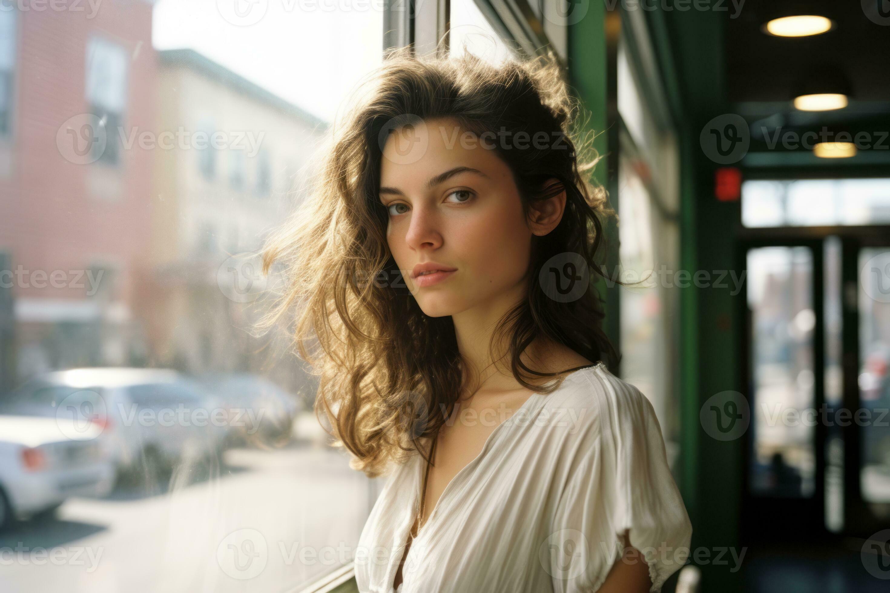 a woman with big boobs standing in front of a window generative ai 32096158  Stock Photo at Vecteezy