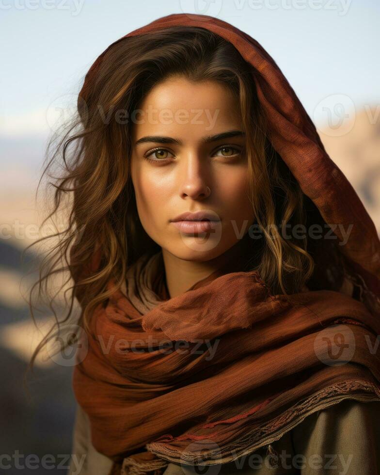 a beautiful young woman with a scarf on her head in the desert generative ai photo