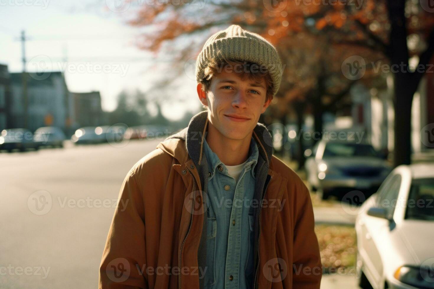 a young man wearing a beanie and jacket standing on a street generative ai photo