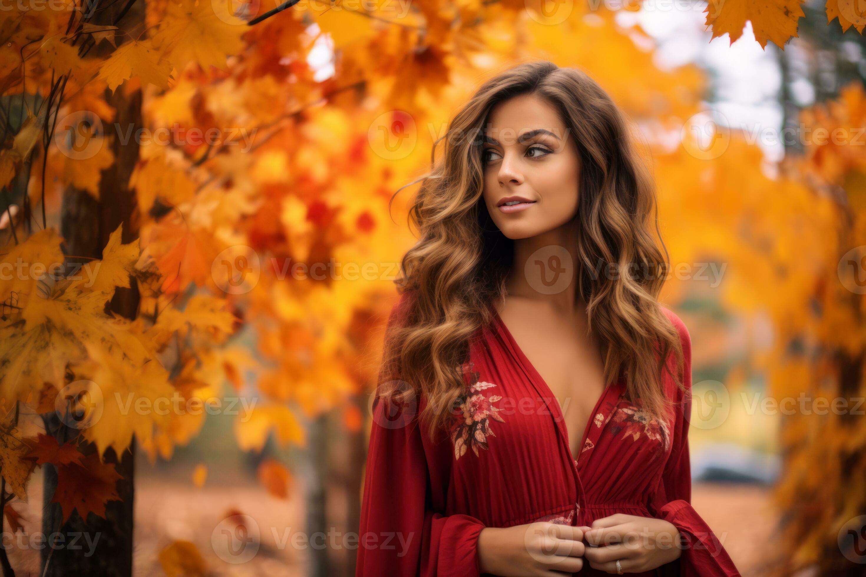 beautiful woman in red dress standing in autumn leaves generative ai  28387333 Stock Photo at Vecteezy