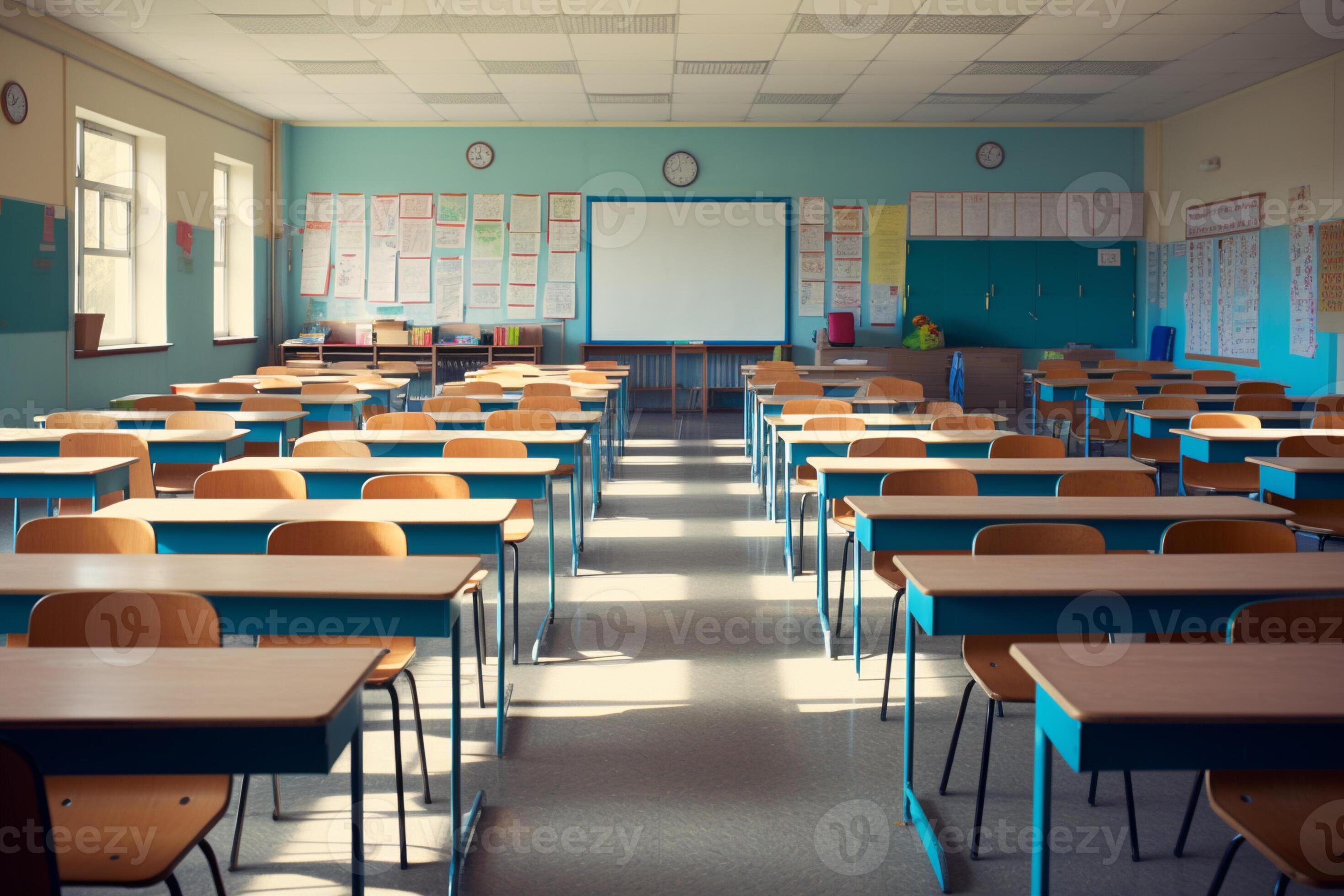 there are many desks and chairs in this classroom with a clock on the