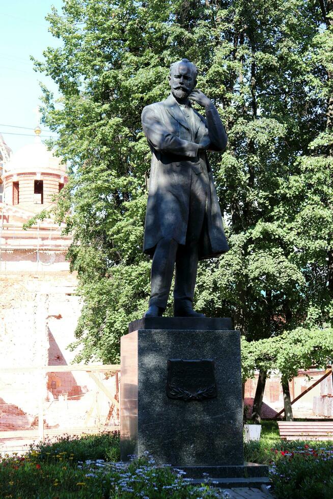 Klin, Moscow, Russia - 07.30.2023. Monument to Russian composer Pyotr Ilyich Tchaikovsky, memorial, stone sculpture. Sculptor - Christopher Gevorgyan photo